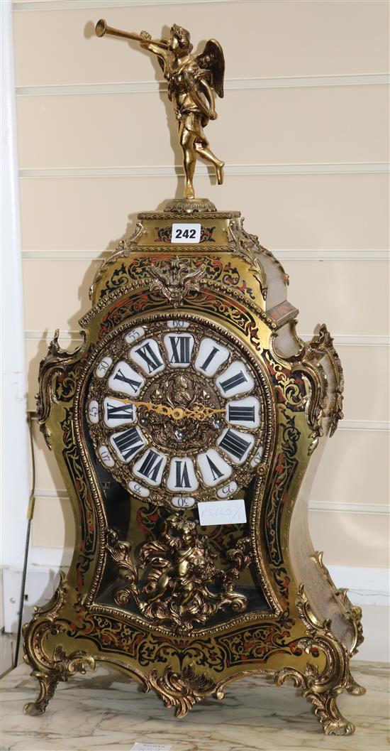 A quarter chiming boulle mantel clock H.75cm